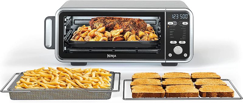 Photo 1 of Ninja SP301 Dual Heat Air Fry Countertop 13-in-1 Oven with Extended Height, XL Capacity, Flip Up & Away Capability for Storage Space, with Air Fry Basket, SearPlate, Wire Rack & Crumb Tray, Silver--------DENT ON THE SIDE ------VIEW PIC----
