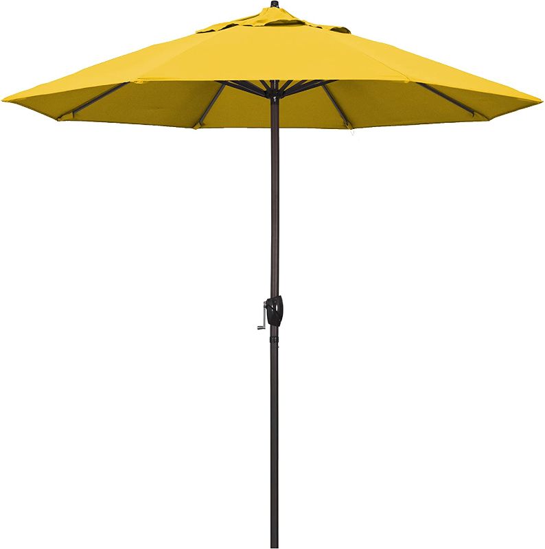 Photo 1 of California Umbrella 9' Round Aluminum Market Umbrella, Crank Lift, Auto Tilt, Bronze Pole, Lemon Olefin
