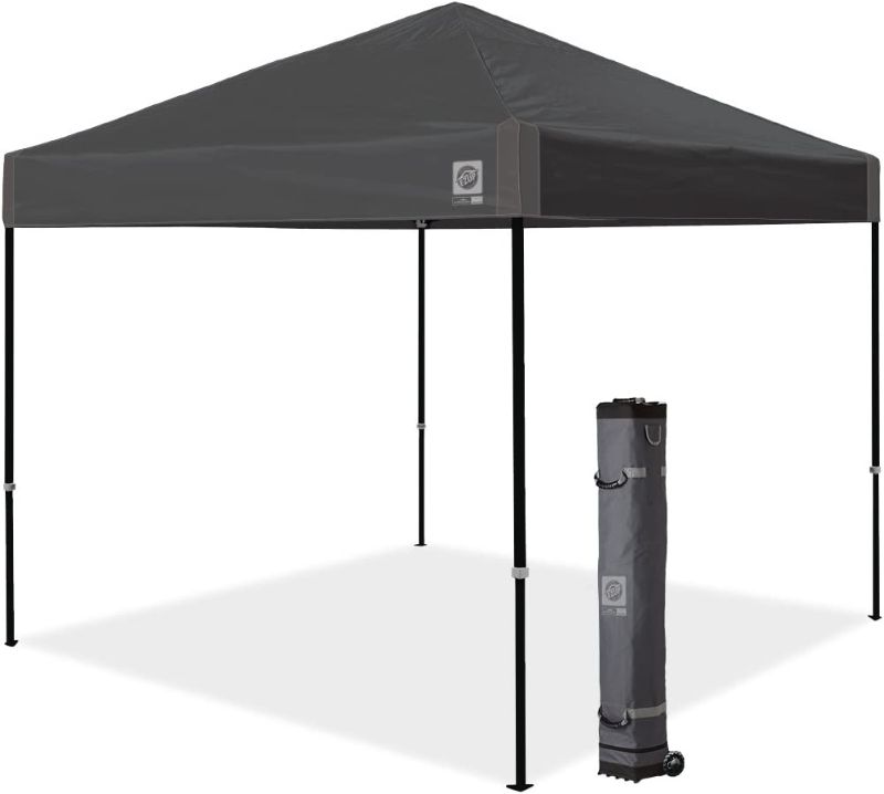 Photo 1 of E-Z UP Ambassador Instant Shelter Canopy, 10' x 10', Roller Bag and 4 Piece Spike Set, Steel Gray----there is some bends in the bars ---------
