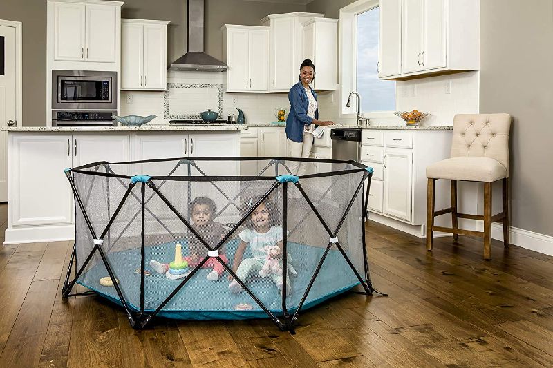 Photo 1 of Regalo My Play Deluxe Extra Large Portable Play Yard Indoor and Outdoor, Bonus Kit, Washable, Teal, 8-Panel-----is used ------
