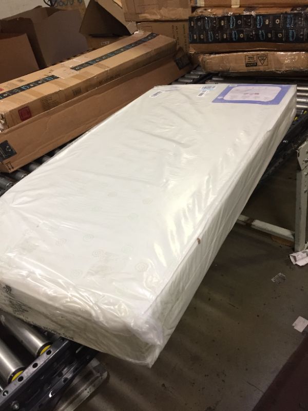 Photo 1 of Delta Children Twinkle Galaxy Dual Sided Crib and Toddler Mattress - Premium Sustainably Sourced Fiber Core - Waterproof - GREENGUARD Gold Certified (Non-Toxic) - 7 Year Warranty - Made in USA      52x27.5x5 Inch
