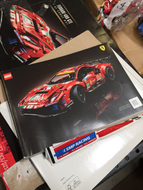 Photo 5 of LEGO Technic Ferrari 488 GTE “AF Corse #51” 42125 Building Kit; Make a Faithful Version of The Famous Racing Car, New 2021 (1,677 Pieces)--------used and opened possibly missing parts -------sale for parts only 
