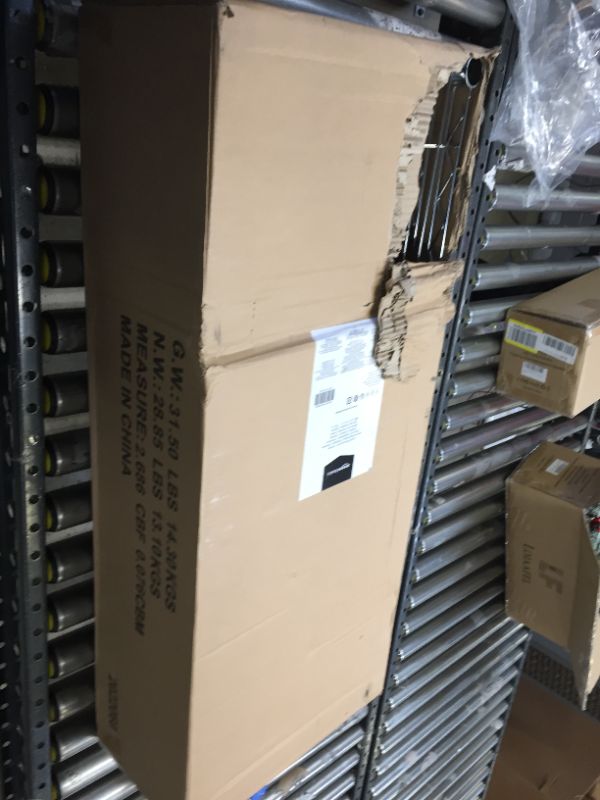 Photo 2 of AmazonBasics 5-Shelf Adjustable, Heavy Duty Storage Shelving Unit PKG DMG, VERY MINIMAL SCUFF AS A RESULT 