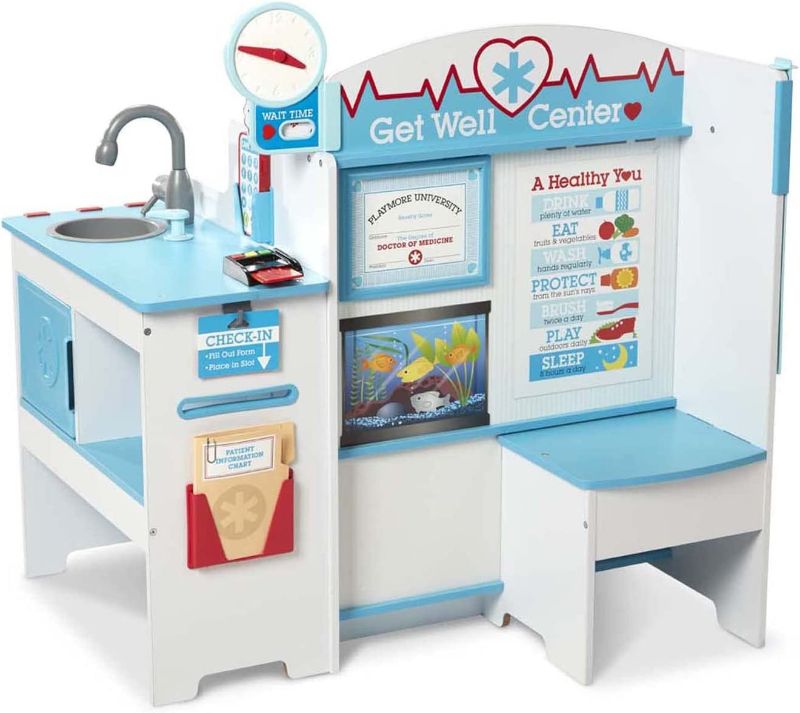 Photo 1 of Melissa & Doug Wooden Get Well Doctor Activity Center - Waiting Room, Exam Room, Check-In Area, PACKAGE DMG 

