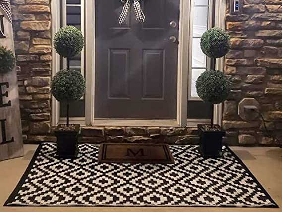 Photo 1 of Black and White Reversible Outdoor Rug That's UV and Stain Resistant. Ideal Outdoor Carpet and Patio Rug at 6 ft x 3.9 ft (180 cm x 120 cm). Looks Great in Gardens, Decks and on Balconies.
