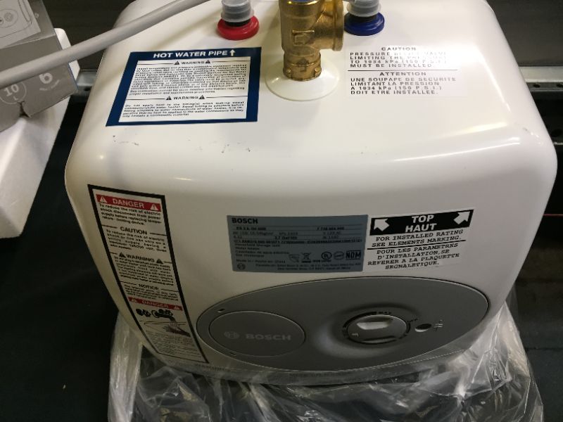 Photo 2 of Bosch Electric Mini-Tank Water Heater Tronic 3000 T 2.5-Gallon (ES2.5) - Eliminate Time for Hot Water - Shelf, Wall or Floor Mounted
(MINOR SCRATHES ON ITEM, STICKY RESIDUE ON BACK OF ITEM)