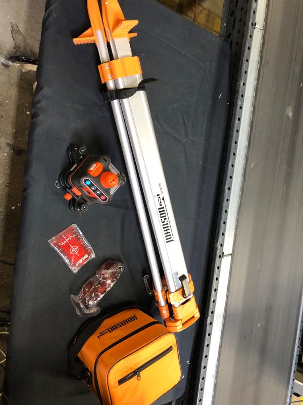 Photo 3 of Johnson Level and Tool 40-6502 Manual-Leveling Rotary Laser Level with Johnson Level & Tool 40-6335 Contractor Aluminum Tripod with 5/8" - 11 Thread, 4'-5' Working Height, Silver/Orange, 1 Tripod - missing batteries / scratches from previous usage 
