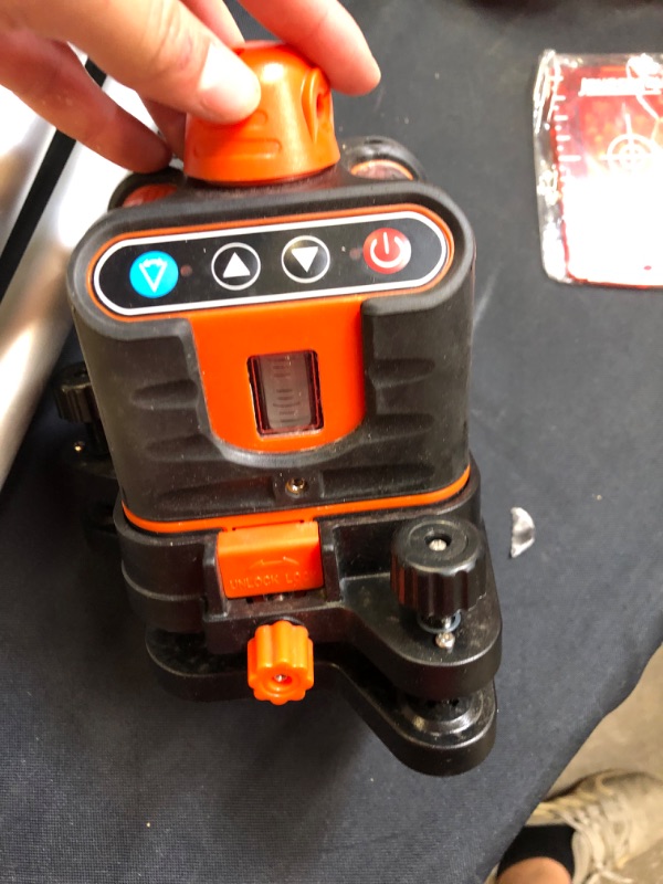 Photo 1 of Johnson Level and Tool 40-6502 Manual-Leveling Rotary Laser Level with Johnson Level & Tool 40-6335 Contractor Aluminum Tripod with 5/8" - 11 Thread, 4'-5' Working Height, Silver/Orange, 1 Tripod - missing batteries / scratches from previous usage 
