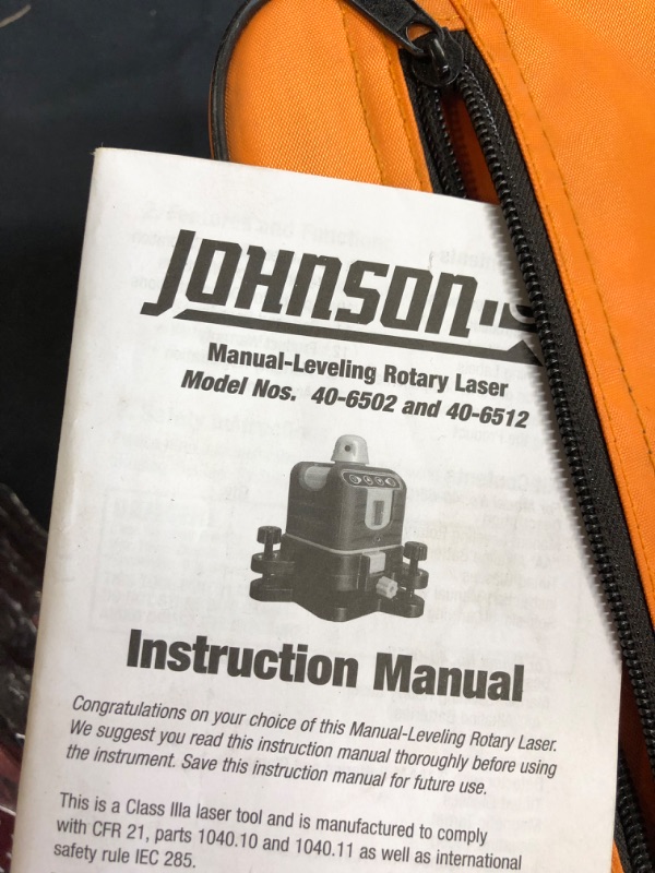 Photo 13 of Johnson Level and Tool 40-6502 Manual-Leveling Rotary Laser Level with Johnson Level & Tool 40-6335 Contractor Aluminum Tripod with 5/8" - 11 Thread, 4'-5' Working Height, Silver/Orange, 1 Tripod - missing batteries / scratches from previous usage 
