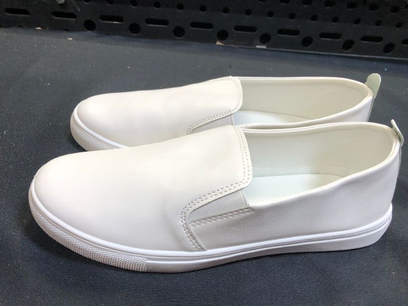 Photo 2 of generic white slip on shoes size 9