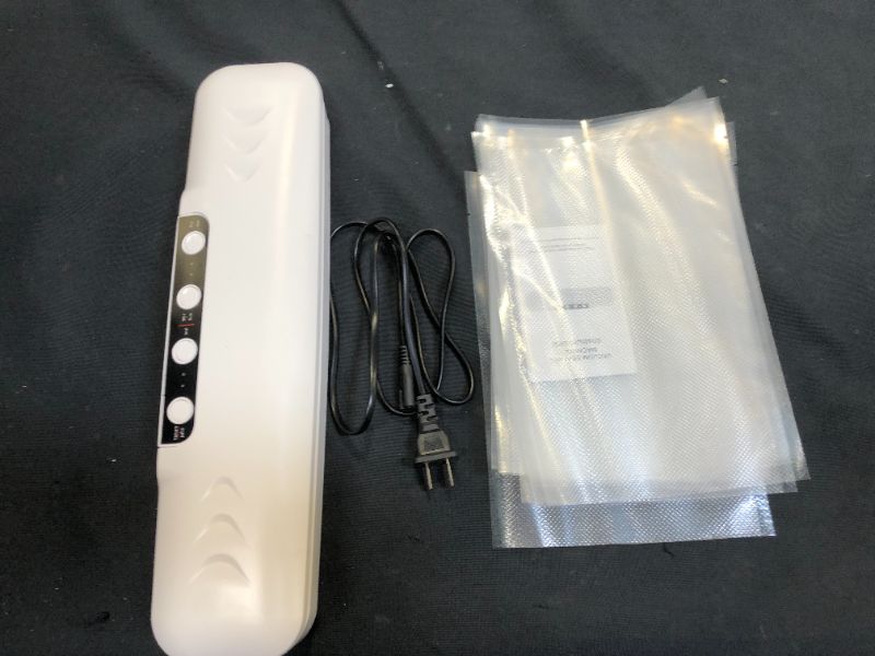 Photo 1 of generic vacuum sealing machine 