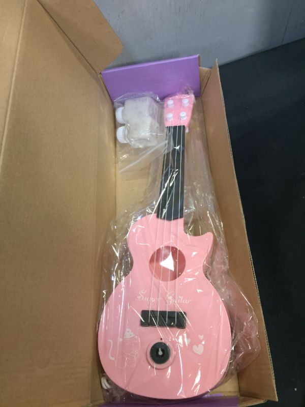 Photo 1 of Bubble Machine for Kids, Automatic Bubble Maker with Musical, Guitar Bubble Blower Toys for Toddlers 1-3, Party, Outdoor Activity, Birthday Gift, Pink
