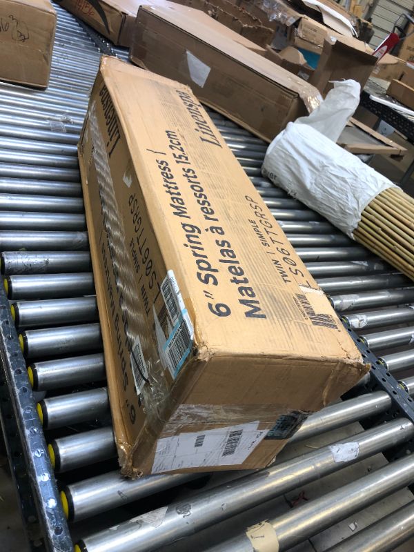 Photo 2 of Linenspa 6 Inch Innerspring Twin Mattress with Foam Layer - Firm Feel -?CertiPUR-US Certified -?Mattress in a Box. Box Packaging Damaged, Item is New, Item is Sealed
