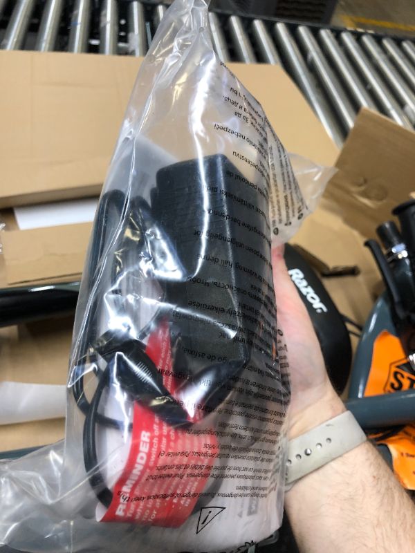 Photo 7 of Razor E300 Electric Scooter. Box Packaging Damaged, Minor Scratches and Scuffs on Metal, Turns on and Runs.  Missing Hardware For Seat