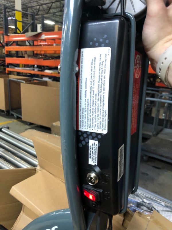 Photo 5 of Razor E300 Electric Scooter. Box Packaging Damaged, Minor Scratches and Scuffs on Metal, Turns on and Runs.  Missing Hardware For Seat