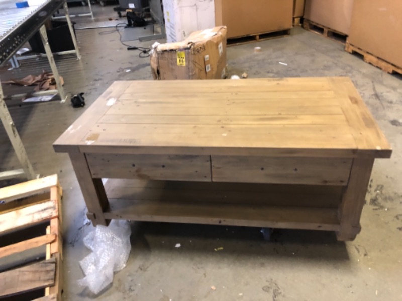 Photo 1 of 20Inch Tall, 27 inch wide, 51 inch long Coffee Table. Scratches and Scuffs, Wood Chips on Edges of Table.