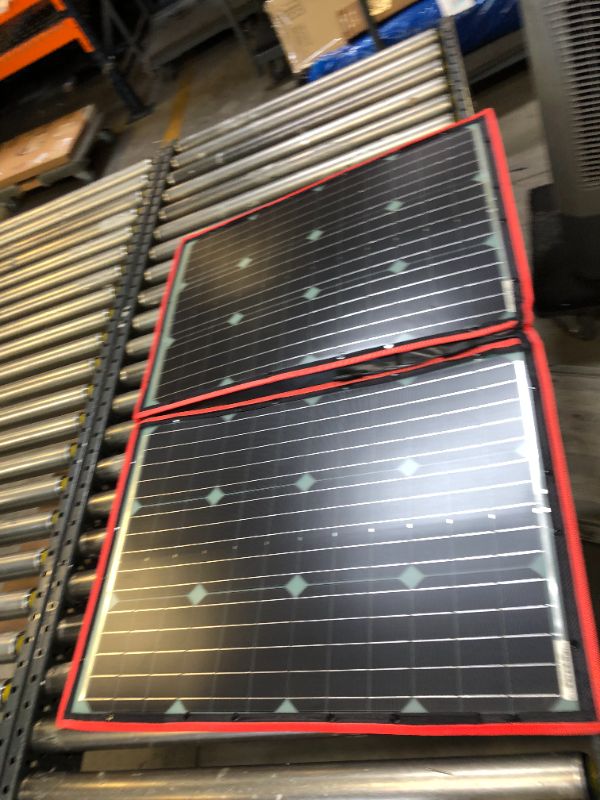 Photo 2 of DOKIO 100 Watts 12 Volts Monocrystalline Foldable Solar Panel with Charge Controller. Moderate Use, No Box "Packaging.