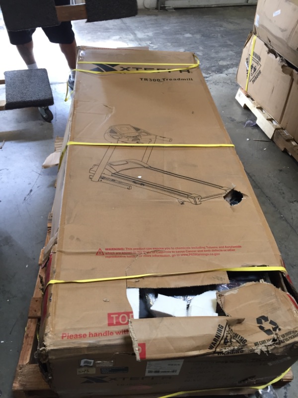 Photo 2 of XTERRA Fitness TR300 Folding Treadmill. Factory Sealed, Box Packaging Damaged, Item is New
