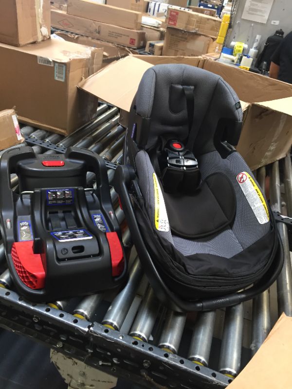 Photo 3 of Britax B-Lively & B-Safe Gen2 Travel System Cobblestone SafeWash. Car Seat is Moderate Use, With Scratches and Scuffs on item. Stroller is New, Box Packaging Damaged.
