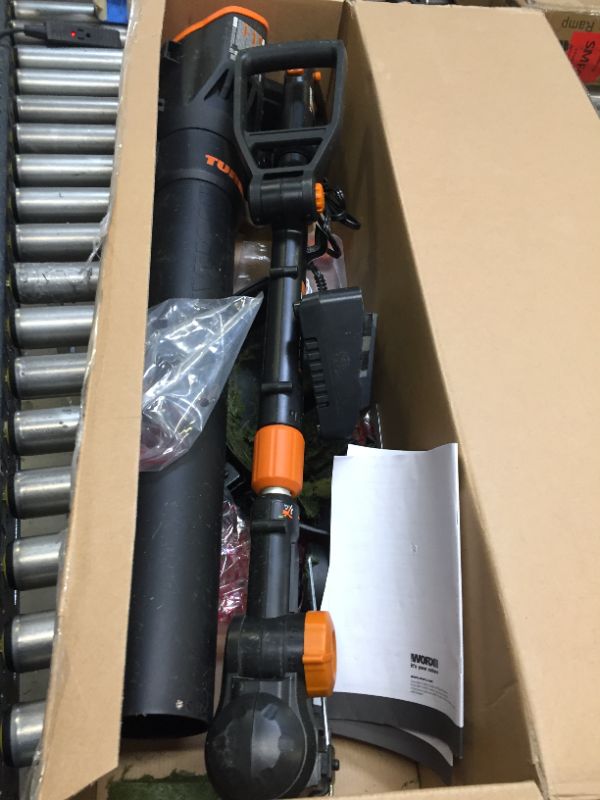 Photo 3 of WORX 20V GT Revolution 12" Cordless String Trimmer & Turbine Leaf Blower Power Share Combo Kit - WG930.2 (Batteries & Charger Included) Missing Batteries, Heavy Use, Scratches and Scuffs on Item, Grass Stains on item. Could Not Test,
