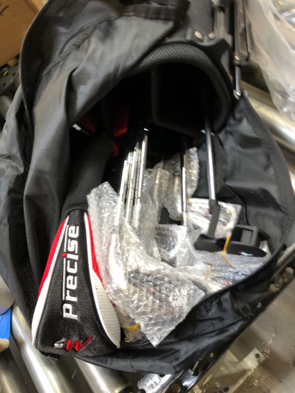Photo 5 of Precise M5 Men's Complete Golf Clubs Package Set Includes Titanium Driver, S.S. Fairway, S.S. Hybrid, S.S. 5-PW Irons, Putter, Stand Bag, 3 H/C's. for Right Handed Golferss. One of Golf Clubs are Broken,. Moderate use on Item and Clubs. Box Packaging Dama
