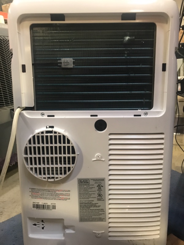 Photo 6 of BLACK+DECKER 8,000 BTU Portable Air Conditioner with Remote Control, White. Remote did not turn on. Back piece could not go back in.
