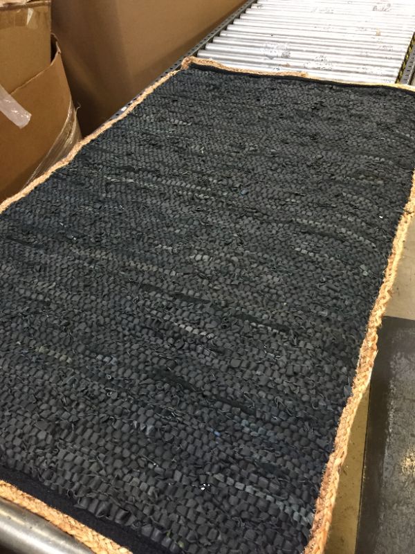 Photo 1 of 35"x55" leather weaved area rug 