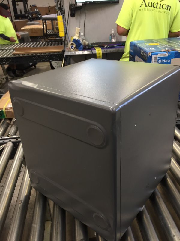 Photo 1 of SentrySafe SF123ES Fireproof Safe with Digital Keypad 1.23 Cubic Feet, Black. No Box Packaging, Moderate Use. Dents in Metal on Top Corner and Side, Locked Could not Open, Does not Light up, Batteries Could be Dead
