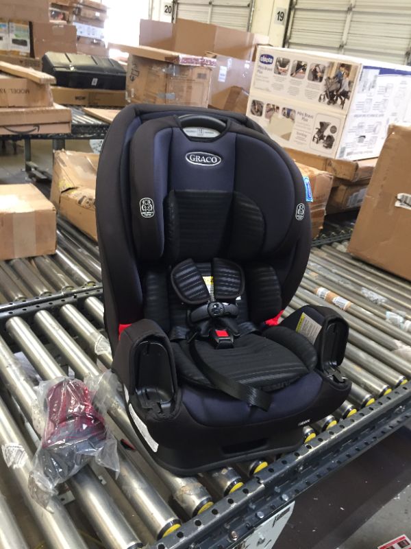 Photo 2 of Graco TriRide 3 in 1 Car Seat | 3 Modes of Use from Rear Facing to Highback Booster Car Seat, Clybourne. Box Packaging Damaged, Minor Use. 
