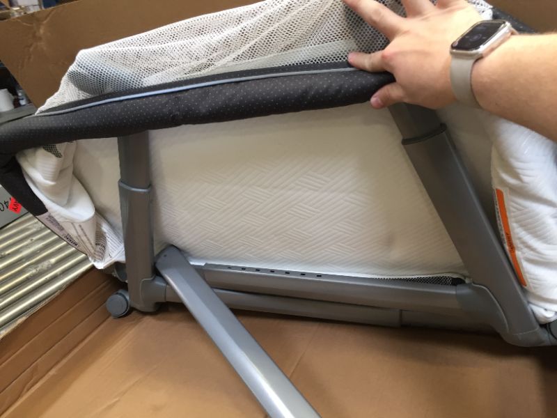 Photo 1 of Dream On Me Waves Bassinet and Bedside Sleeper & Playard, Compact Portable & Travel Friendly, Grows with Baby, Dark Gray, 16.7 lb. Moderate Use, Scratches and sCuffs on ITem, Box Packaging Damaged,
