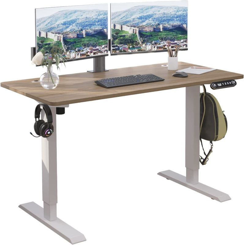 Photo 1 of Electric Standing Desk 48 x 24 Inches, BilBil Height Adjustable Stand Up Desk Home Office Desks with 4 Memory Presets
