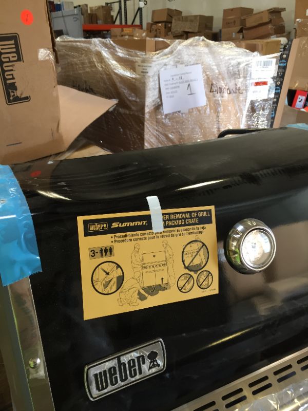 Photo 11 of Weber Summit E-470 580-Square-Inch 48,800-BTU Liquid-Propane G, Black------THERE IS A MINOR DENT ON TOP OF THE LID ------ALL THE ACCESSORIES ARE AT THE BOTTOM UNDER THE BBQ ---SEE PICTURES 
