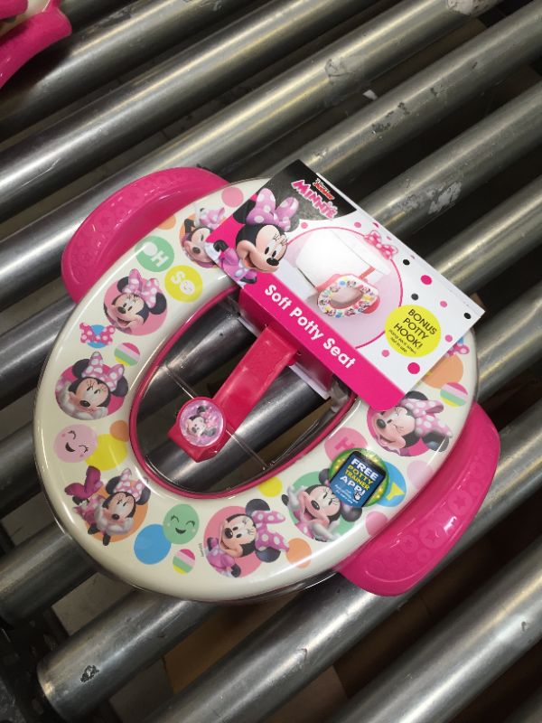 Photo 2 of Disney Baby Minnie "Pop Attitude" Soft Potty Seat with Potty Hook

