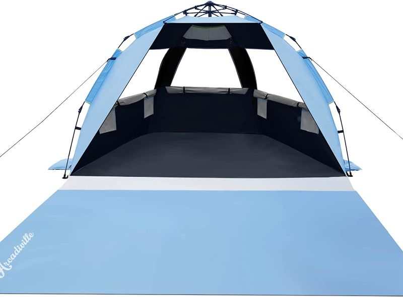 Photo 1 of ArcadiVille Beach Tent Pop up, UPF 50+ Sun Shelter 4 Person Tent w/ Blackout Anti-UV Coating to Body Cooling, Portable Lightweight Beach Sun Shade Canopy w/ Extended Floor, 3 Ventilated Windows----the carrying case is damaged 
