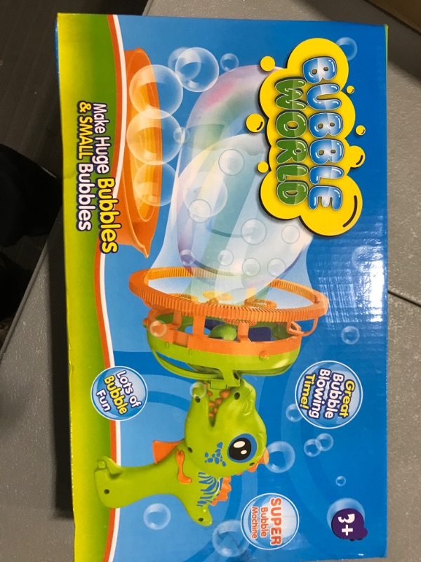 Photo 1 of BUBBLE WORLD DINOSAUR GUN 