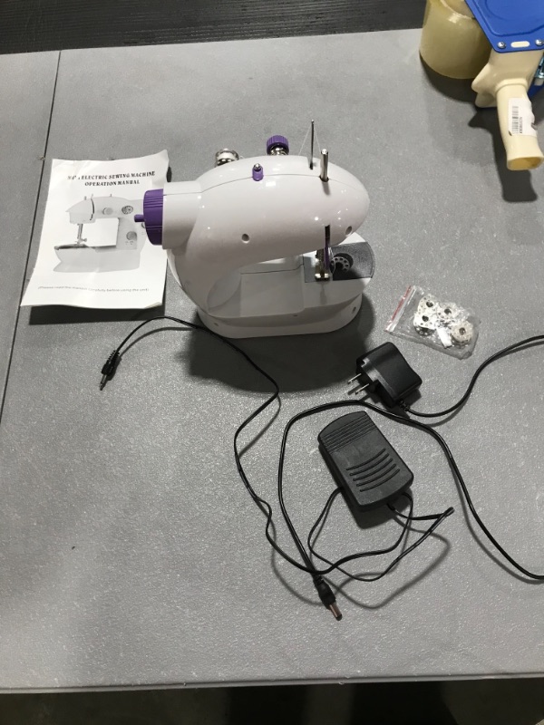 Photo 2 of Mini Sewing Machine with DIY Materials for Kids Beginners, Enjoylf Upgraded Portable Sewing Machine with Lamp,Cutter and Foot Pedal 2-Speed 2-Thread Without Extension Table1