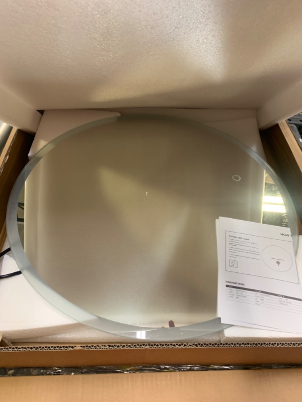 Photo 1 of 24" Round Led Mirror, Box Packaging Damaged, Moderate Use, Scratches and Scuffs on item
