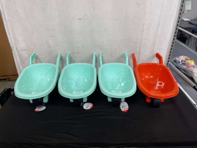 Photo 1 of 4N PIECE PLASTIC KIDS WHEELBARROW, 3 TEAL 1 RED