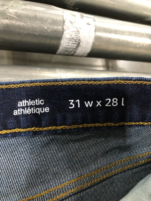 Photo 1 of Amazon Essentials Men's Athletic-Fit Stretch Jean, Dark Wash, 31W X 28L

