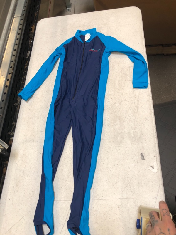 Photo 1 of kids blue dive wetsuit 39 inch long says its a large 