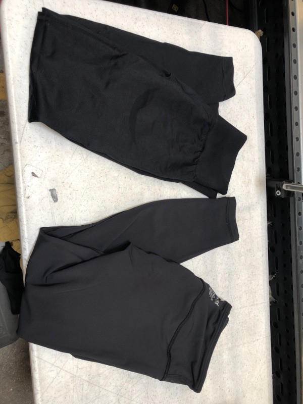 Photo 1 of 2 pairs of black leggings size xl