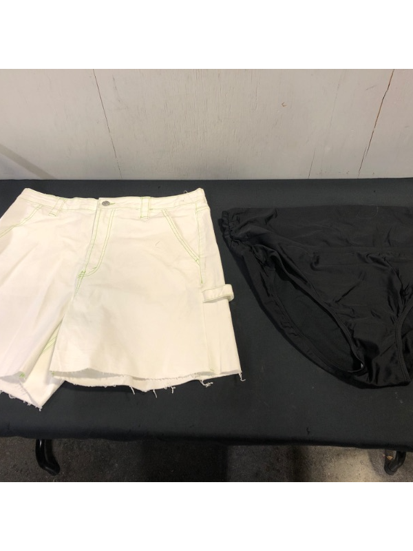 Photo 1 of CLOTHING BUNDLE (2 COUNT)
SHORTS SIZE 16; BATHING SUIT BOTTOMS XL