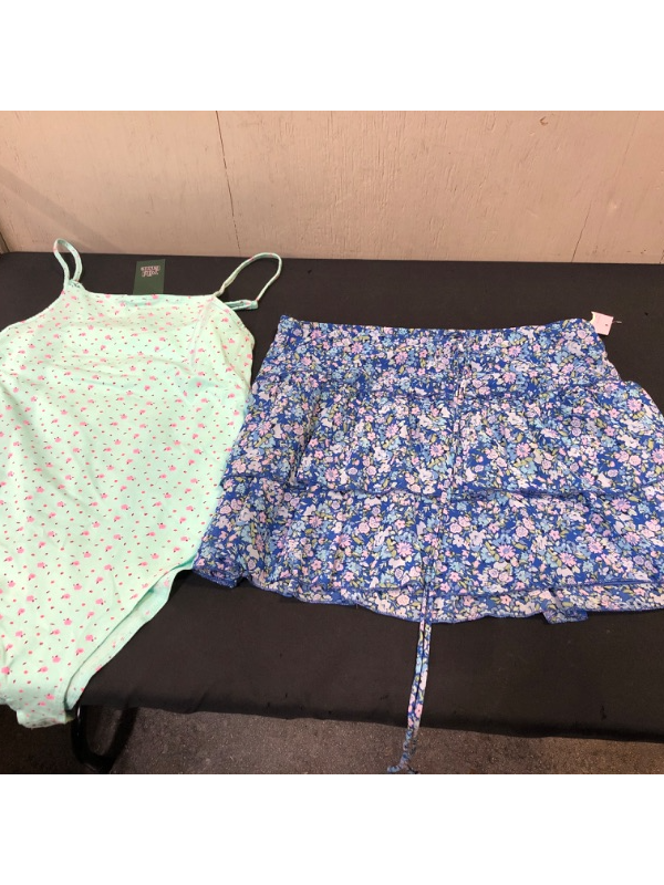 Photo 1 of CLOTHING BUNDLE (2 COUNT)
BODYSUIT M; SKIRT L