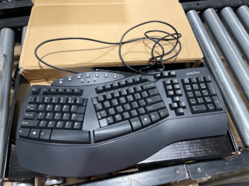 Photo 1 of Perixx Periboard-512 Ergonomic Split Keyboard - Natural Ergonomic Design - Black - Bulky Size 19.09"x9.29"x1.73", US English Layout