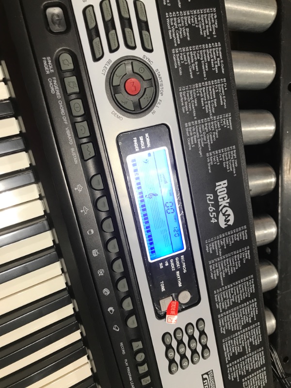 Photo 3 of RockJam 54-Key Portable Electronic Keyboard with Interactive LCD Screen & Includes Piano Maestro Teaching App with 30 Songs & Adjustable Keyboard Stand with Locking Straps & Quick Release Mechanism