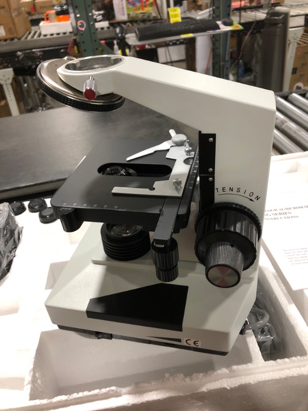 Photo 4 of AmScope B490B Compound Binocular Microscope, WF10x and WF20x Eyepieces, 40X-2000X Magnification, Brightfield, Halogen Illumination, Abbe Condenser, Double-Layer Mechanical Stage, Sliding Head, High-Resolution Optics, Anti-Mold , White