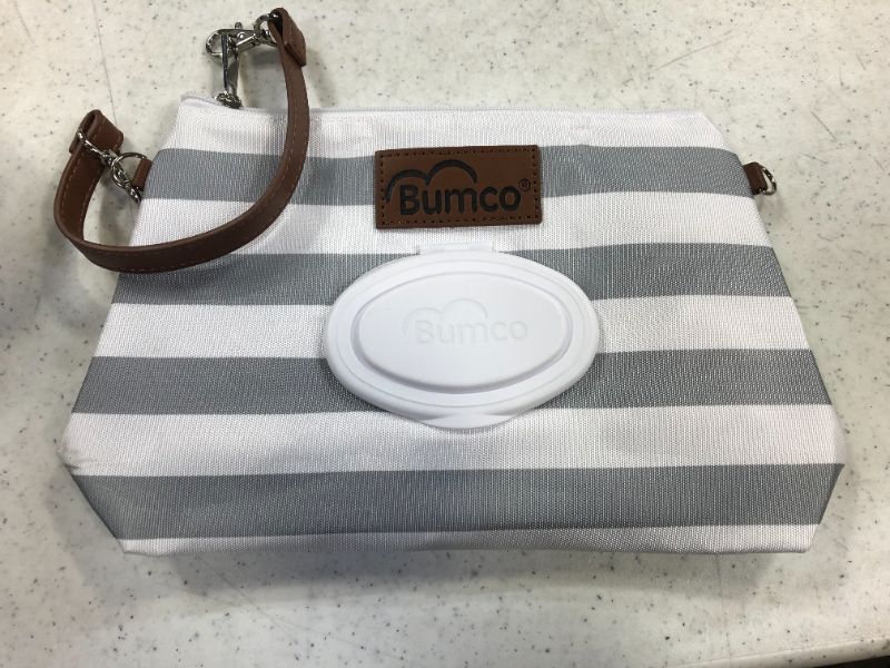 Photo 4 of Bumco Diaper Clutch Bag - Water Resistant; Lightweight; Refillable Wipes Dispenser; Portable Changing Kit (Classic Gray)
