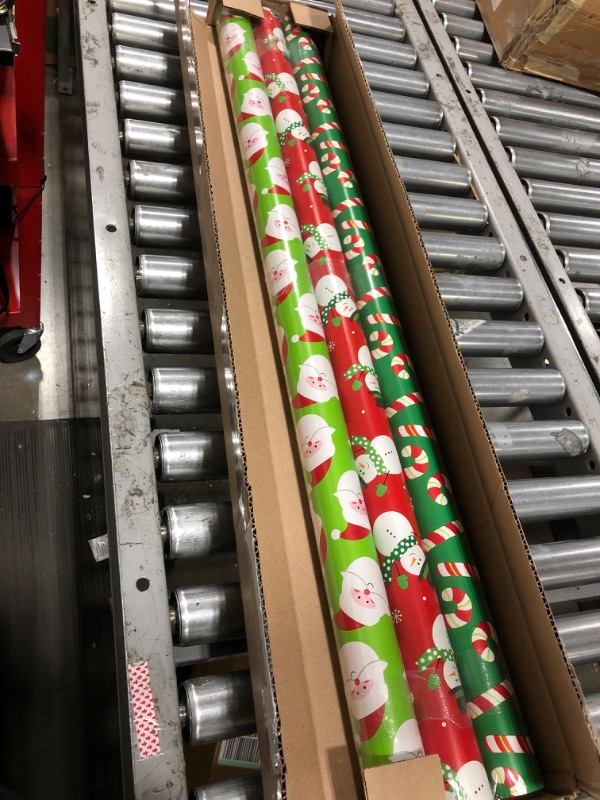 Photo 2 of American Greetings Reversible Christmas Extra-Wide Wrapping Paper Bundle, Santa, Snowmen and Candy Canes (3 Rolls, 120 sq. ft.)