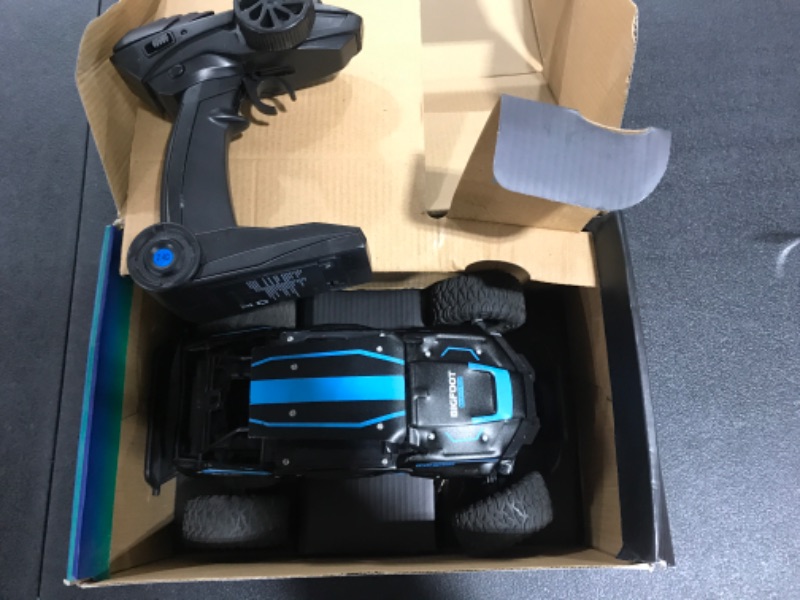 Photo 1 of BEZGAR TB142 RC Cars-1:14 Scale Remote Control Car, 2WD High Speed 20 Km/h All Terrains Electric Toy Off Road RC Vehicle Truck Crawler with Rechargeable Battery for Boys Kids and Adults-Blue Blue 1:14 Scale