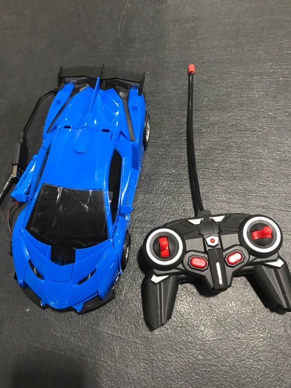 Photo 1 of BLUE REMOTE CONTROL CAR 